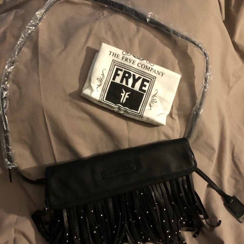 Cross body leather tassel adjustable strap bag